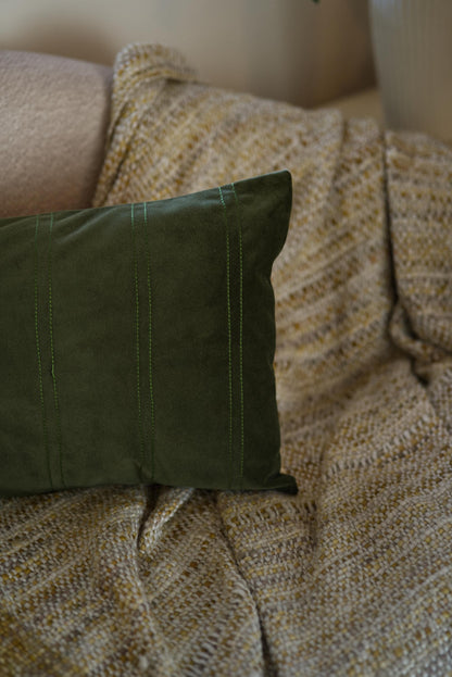 Green velvet lumbar cushion
