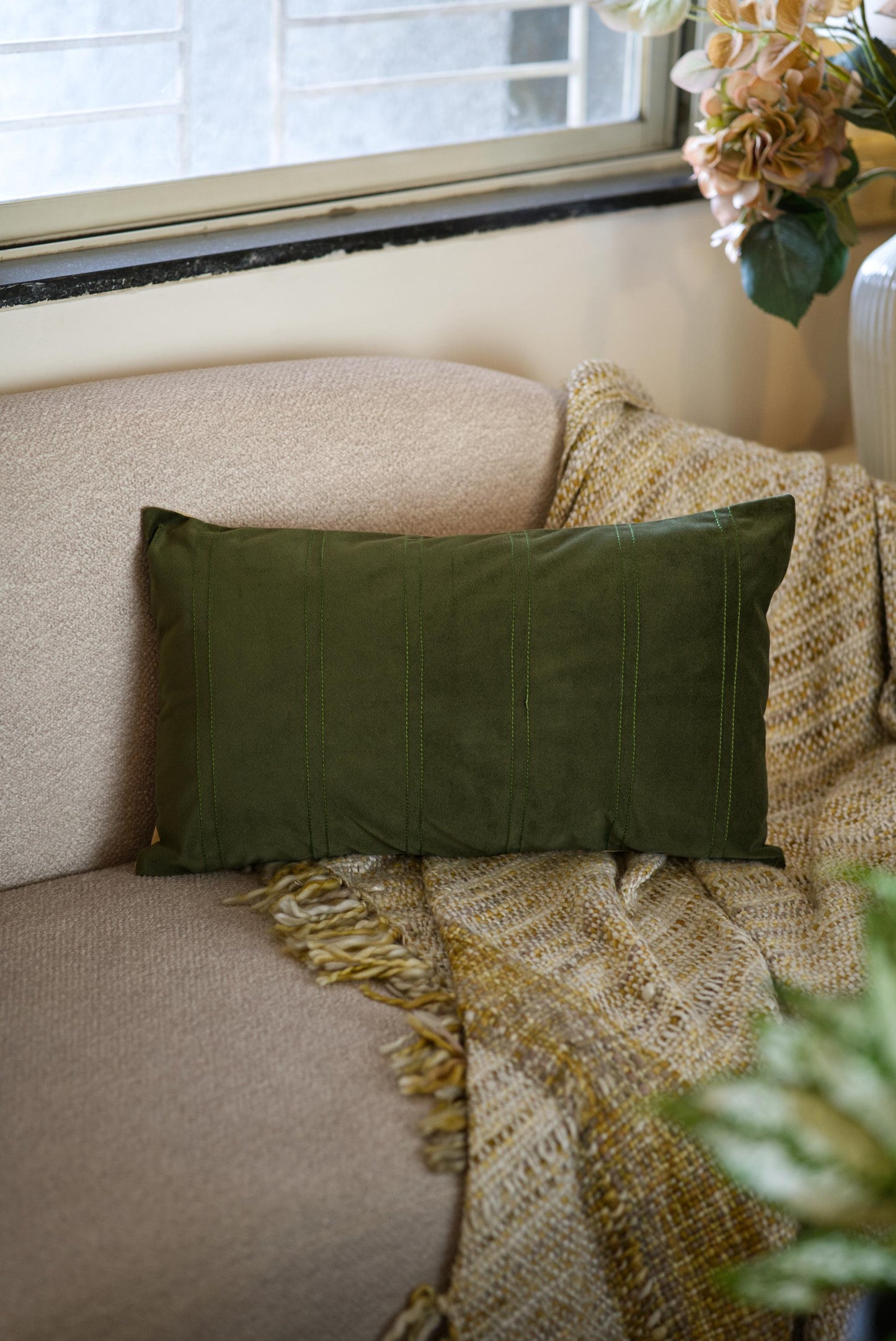 Green velvet lumbar cushion