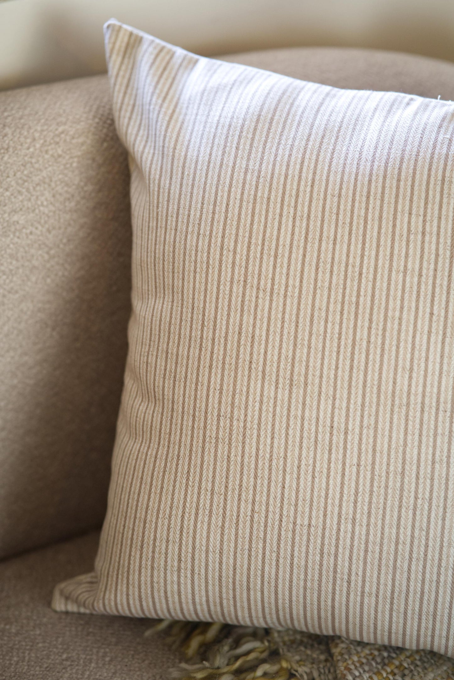 The pinned stripped cushion